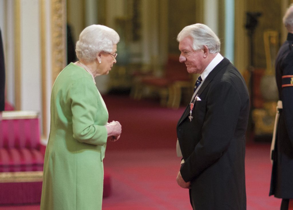 angus-recieving-mbe-from-queen-credit-image-courtesy-of-british-ceremonial-arts-limited-1024x732